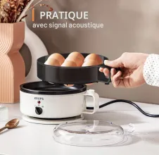 Krups Cuiseur à œufs pour jusqu'à 7 œufs avec verre doseur d'eau avec perce-œufs EG230115